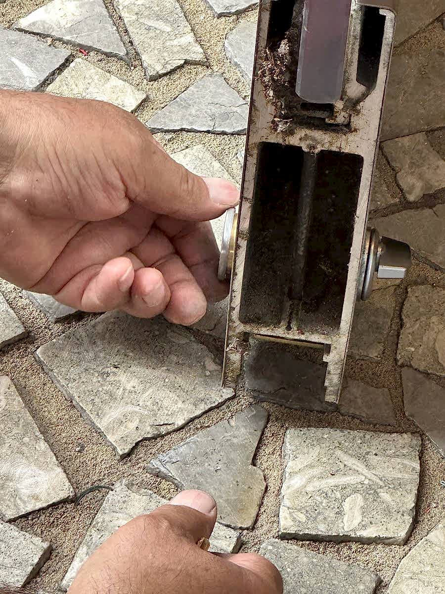 Servicing a mortise lock case on a storefront door